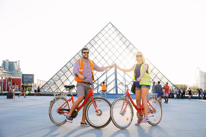Paris by Night City of Lights Sightseeing Guided Bike Tour - Exploring Paris at Night