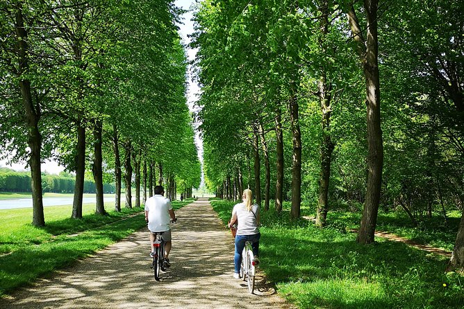 Versailles Bike Tour With Market, Gardens & Guided Palace Tour - Biking Through Versailles