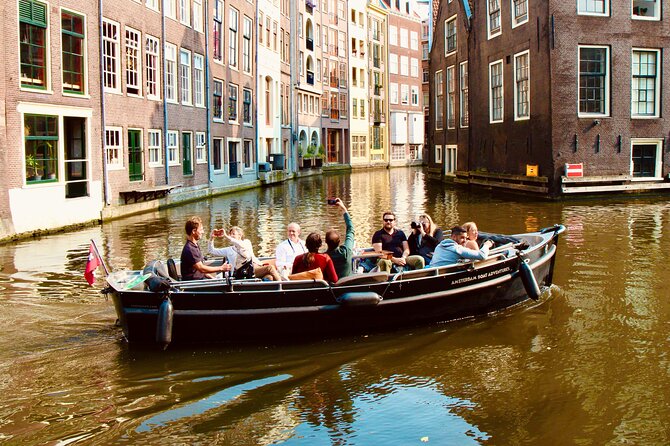 Amsterdam Canal Cruise on a Small Open Boat (Max 12 Guests) - Meeting Point and Accessibility