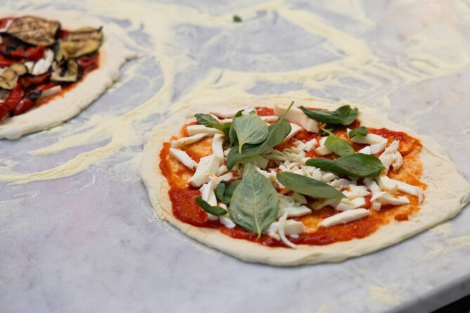 Cooking Class in the Heart of Rome: Pizza and Tiramisu Making - Savoring the Included Beverages