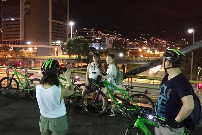 Night Bike Tour In Medellin, Typical Snacks, Beer and Spectacular Viewpoints - Tackling the Hill Climb at the End