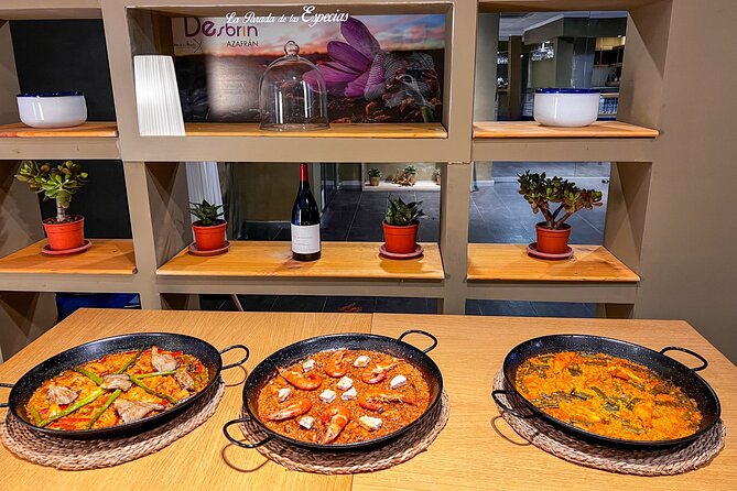 Paella Cooking Class, Wine Tasting & Central Market in Valencia - Savoring the Homemade Paella and Tapas