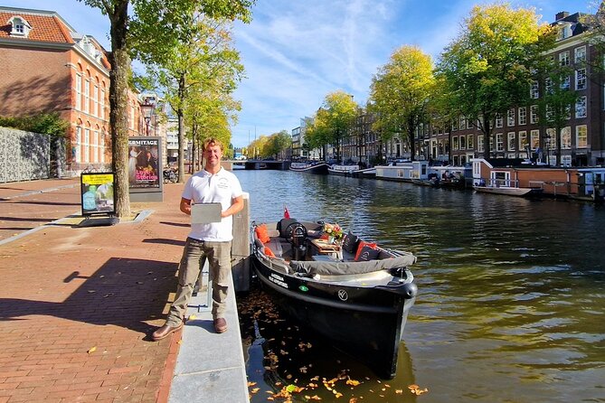 Amsterdam Canal Cruise on a Small Open Boat (Max 12 Guests) - Booking and Pricing