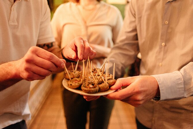 Devour Madrid Tapas & Taverns Small Group Food & History Tour - Taking in the Citys Vibrant Tapas Culture