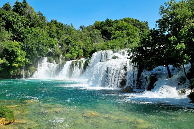 Krka Waterfalls Tour With Trogir Walking Tour and Krka Panoramic Boat Cruise - Panoramic Boat Cruise Along the Krka River