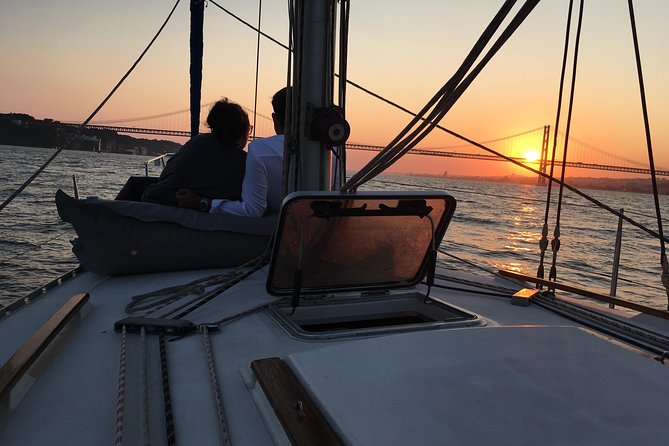 Lisbon Sunset Sailing Tour With White or Rosé Wine and Snacks - The Intimate Sailing Adventure