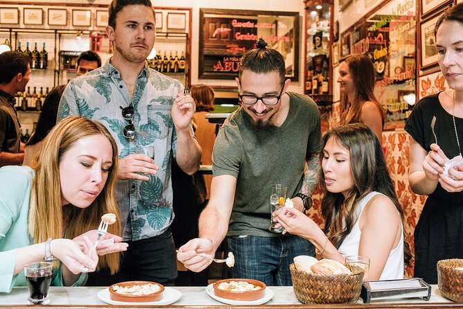Devour Madrid Tapas & Taverns Small Group Food & History Tour - Key Points