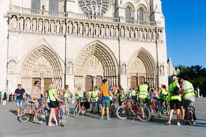 Paris by Night City of Lights Sightseeing Guided Bike Tour - Key Points