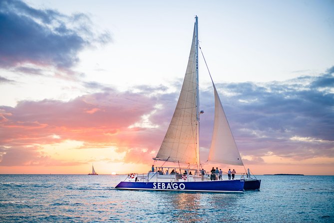 Key West Sunset Sail: Dolphin Watching, Wine, and Tapas - Booking and Pricing Details