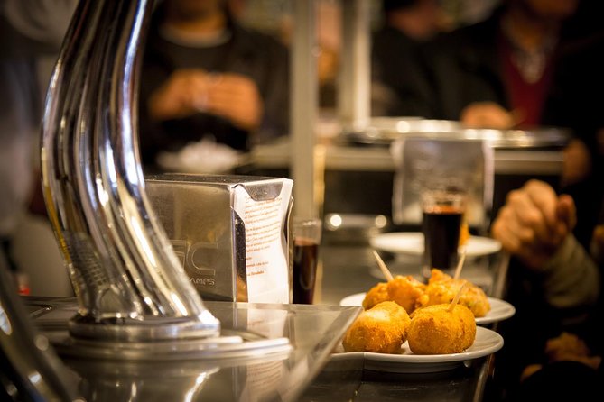 Madrid Locals Tapas Tour Dinner With a Side of History - Guided Tour Details