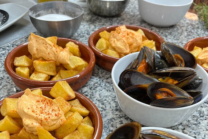 Seafood Paella Cooking Class, Tapas and Visit to Ruzafa Market. - Making Authentic Valencian Sangria