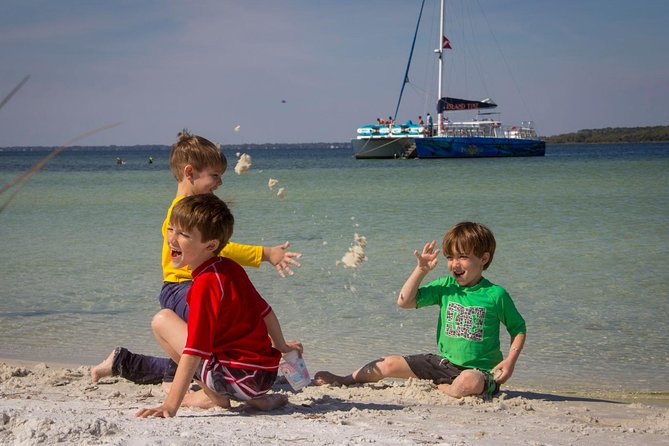 Shell Island Snorkel and Dolphin Catamaran Cruise With Island Time - Meeting and Location Details
