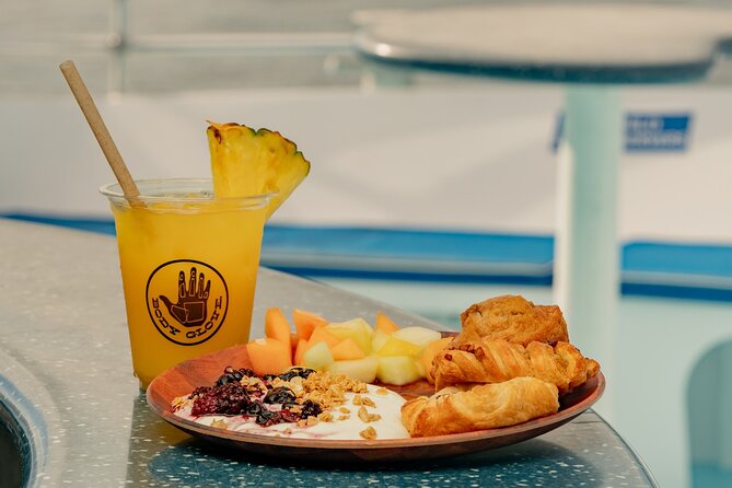 Deluxe Snorkel & Dolphin Watch Aboard a Luxury Catamaran From Kailua-Kona - Onboard Amenities and Accessibility