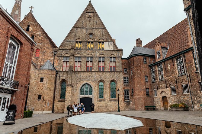 Highlights & Hidden Gems With Locals: Best of Bruges Private Tour - Historic Fish Market and Minnewater Lake