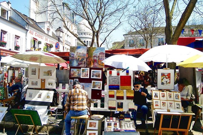 Montmartre District and Sacre Coeur - Exclusive Guided Walking Tour - Exploring the Charming Cobblestone Streets