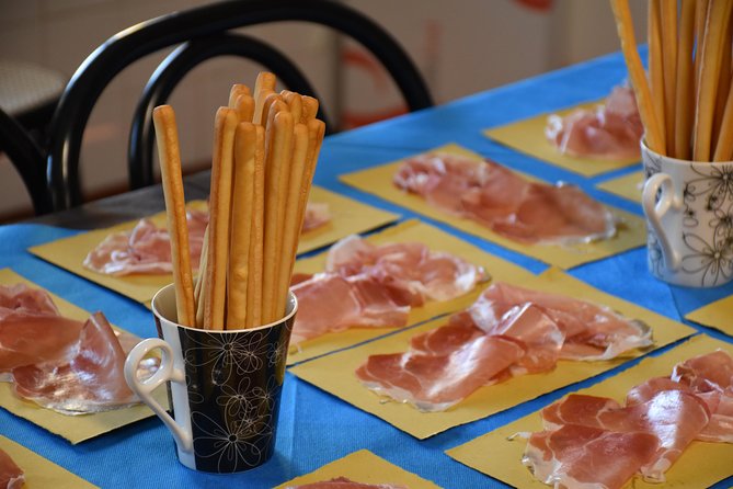 Guided Small-Group Tour Tastybus: Parmesan Cheese and Parma Ham - Production Facility Visits