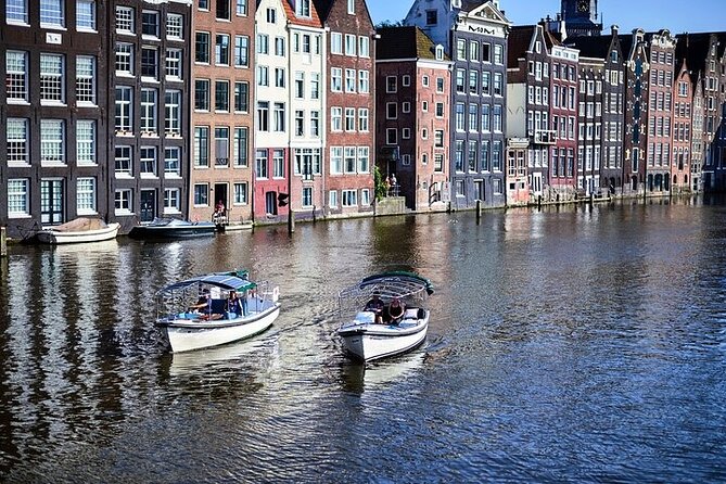 Amsterdam Uncovered: 120 Minutes by Boat - Travelers Testimonials and Insights