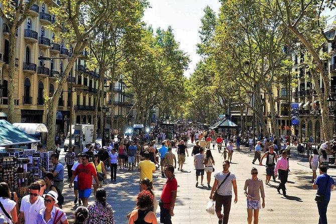 Best of Barcelona: Sagrada Familia & Park Guell Tour With Pick-Up - Exploring Montjüic Mountain