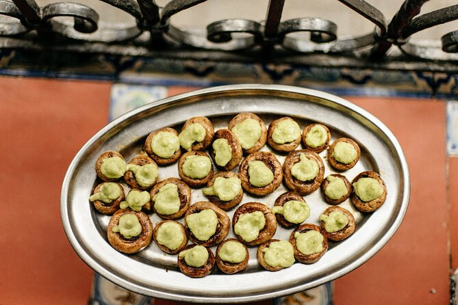 Devour Seville Tapas & Wine Tour Triana Neighborhood - Tour Experience and Atmosphere