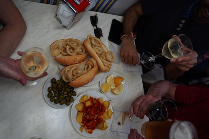 Evening in Madrid: Food on Foot Tapas Adventure With a Local - Meeting Point and Neighborhood Exploration