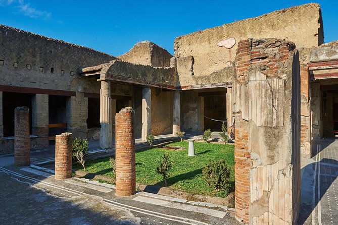Guided Day Tour of Pompeii and Herculaneum With Light Lunch - Exploring Pompeii Archaeological Park