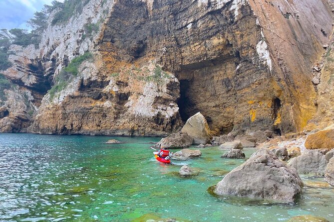 Kayak Paradise: Cala Portixol Snorkel, Cave & Cliff Jumping Tour - Exploring Cala De Portixol