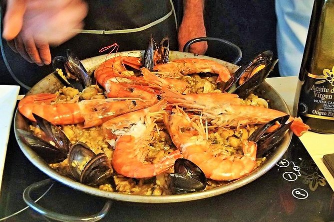 Premium Paella Cooking Class & 10 Spanish Tapas - Exploring the Local Market
