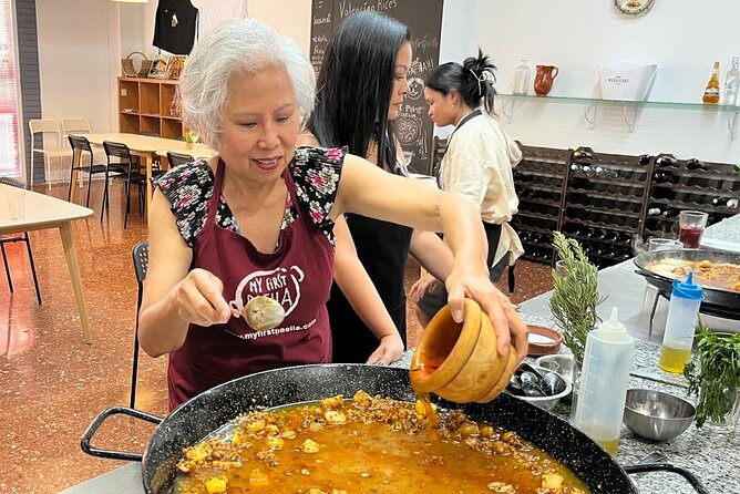 Seafood Paella Cooking Class, Tapas and Visit to Ruzafa Market. - Indulging in Dessert and Local Wines