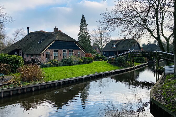 Zaanse Schans and Giethoorn Small-Group Tour With Hotel Pick-Up - Exploring the Historic Windmill Village of Zaanse Schans