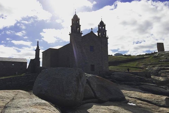 Finisterre and Costa Da Morte the Most Complete Tour From Santiago - Marveling at the Waterfalls of Ezaro
