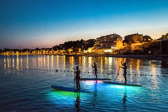 Glowing Stand-Up Paddle Experience in Split - Glow-in-the-Dark Paddle Board Journey