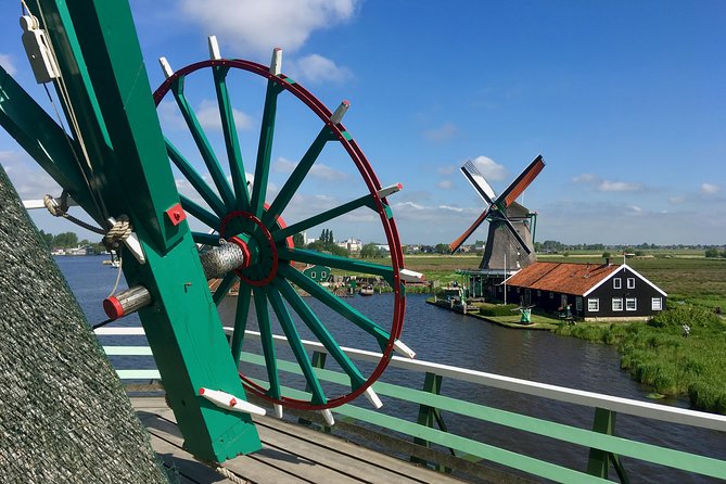 Highlights of Holland Private Guided Tour From Amsterdam - Zaanse Schans: Experiencing Dutch Windmill Heritage
