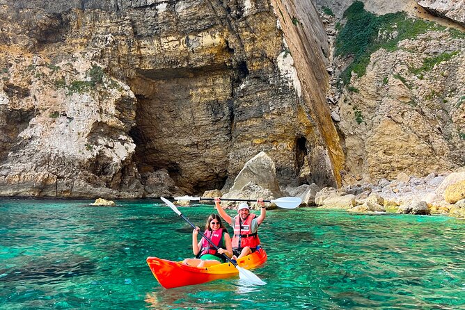 Kayak Paradise: Cala Portixol Snorkel, Cave & Cliff Jumping Tour - Discovering Hidden Caves