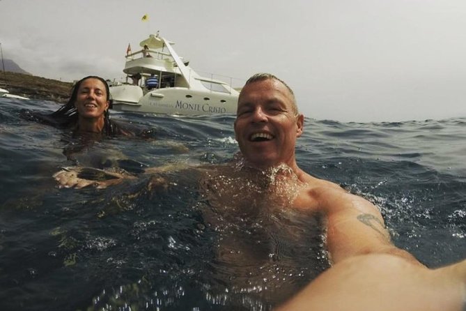 Whale Watching Catamaran Cruise With Transfer, Buffet by MC - Tenerifes Coastal and Mountain Views
