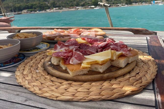 Boat Tour of the Devils Saddle With Swimming and Aperitif Stops - Tour Highlights and Memorable Moments