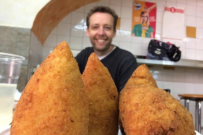 Catania Street Food Walking Tour and Market Adventure - Discovering the Vibrant Fish Market
