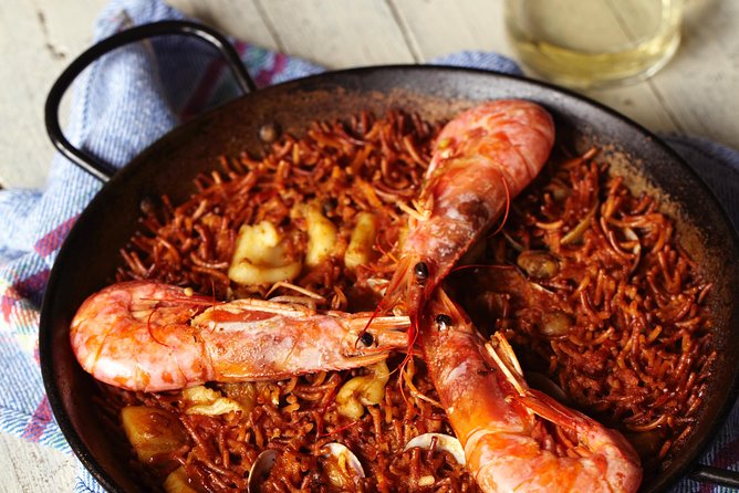 Paella Cooking Class Las Ramblas & Boqueria Market in Barcelona - Savoring the Culinary Creations