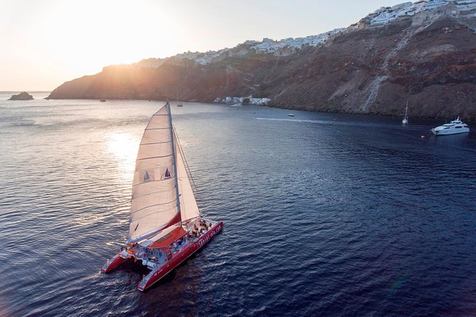 Sailing Catamaran Cruise in Santorini With BBQ, Drinks and Transfer - What to Expect During the Tour