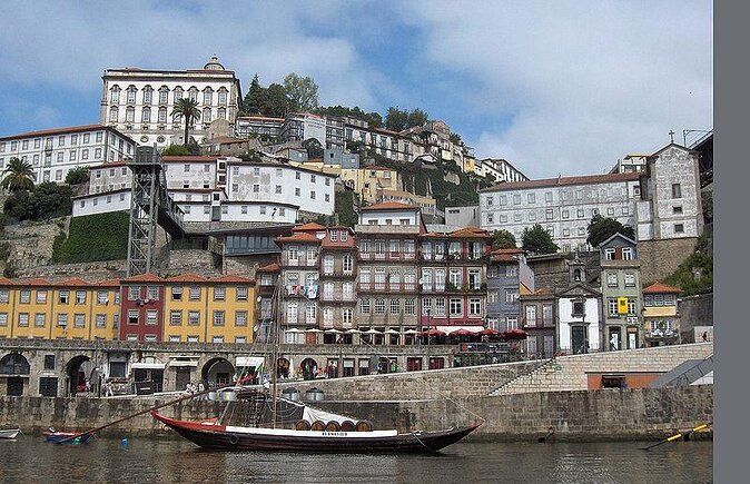 Porto: Boat Tour by the Douro River With Wine and Snacks Included - Key Points