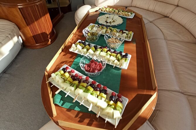 1 Hour Sail + Spanish Lunch or Dinner for 2 People in a Luxury Motor Boat - Admire Barcelona’s Iconic Landmarks from the Water