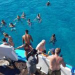 2.5 hour Glass Bottom Boat Trip, Snorkeling, Sliding and Fun - The Fun of Swimming and Snorkeling in Paphos