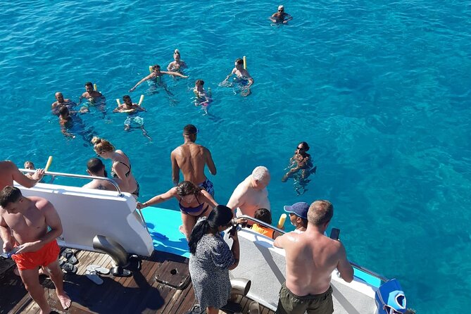 2.5 hour Glass Bottom Boat Trip, Snorkeling, Sliding and Fun - The Fun of Swimming and Snorkeling in Paphos