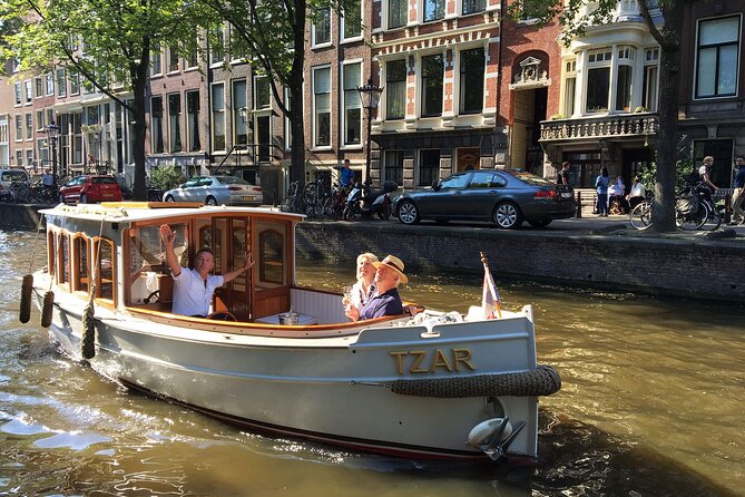 2 hours Private Boat Tour in Amsterdam with welcome drink - The Route: Passing Iconic Landmarks and Canals
