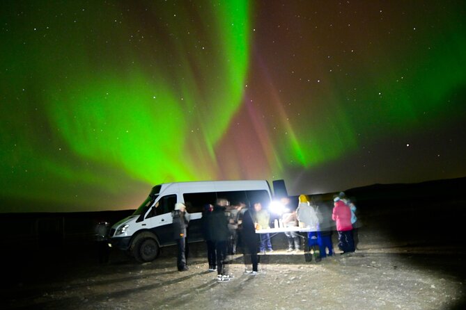 4x4 Minibus Northern Lights with Photo and snacks from Reykjavik - Scenic Departure from Reykjavik into Snowy Icelandic Landscapes