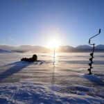 Abisko: Ice Fishing Experience - Learning How to Drill Holes and Use Equipment