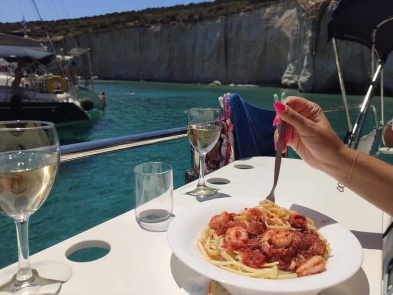 Adamantas: Kleftiko Sailing Cruise with Meal and Swim Stops - Authentic Greek Cuisine and Onboard Drinks