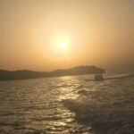 Agia Pelagia: Sunset Motorboat Tour with Soft Drinks - Departing from Blue Water Club in Agia Pelagia