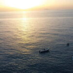 "Al Tramonto sulla Costa degli Dei: Emozioni in Mare" - A Scenic Sunset Departure from Capo Vaticano