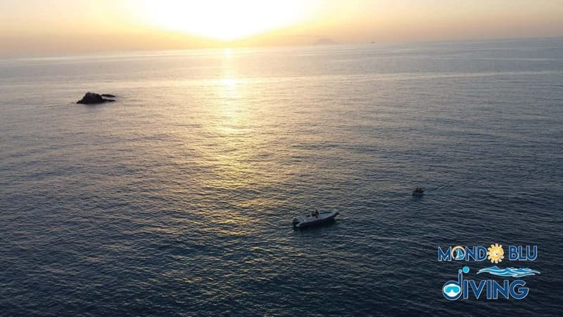 "Al Tramonto sulla Costa degli Dei: Emozioni in Mare" - A Scenic Sunset Departure from Capo Vaticano
