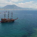 Alanya: Pirate Boat Party with Foam, Disco, Lunch & Drinks - Exploring the Turkish Rivieras Natural Coves and Caves